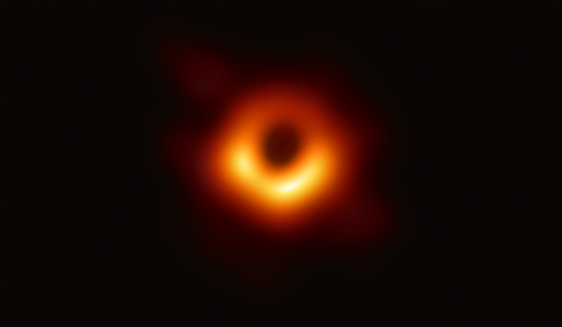 Artistic rendering of a black hole with glowing accretion disc